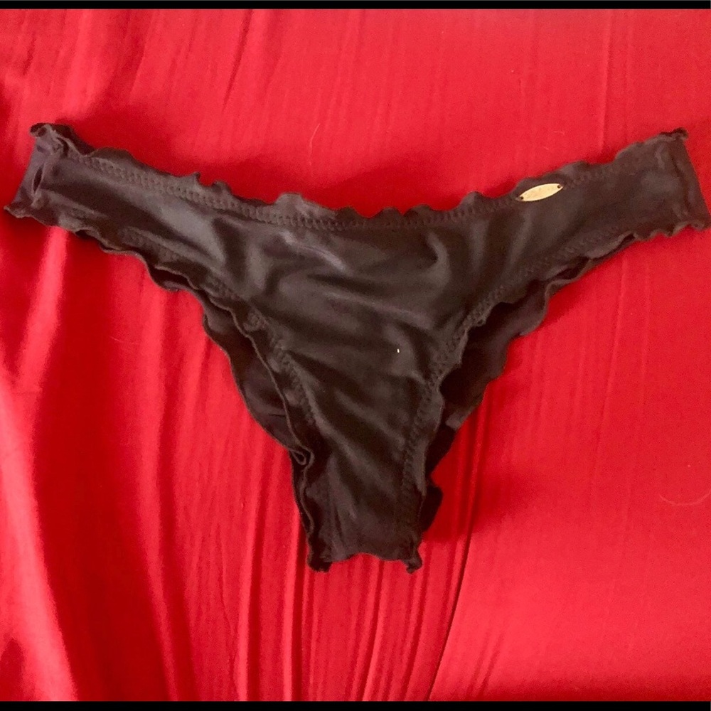 Luli Fama Cosita Buena Wavey ruched bottoms